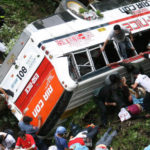 26 KILLED AS PHILIPPINES BUS PLUNGES INTO RAVINE